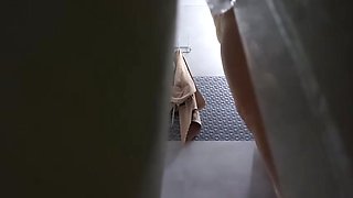 Nude woman in shower butt nakedy