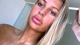 Big Boobed Blonde Masturbates With A Dildo In The Bathroom