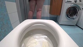 Secret recording in bathroom: Mature wife's intimate moment of urinating. Amateur fetish with chubby milf and close-up shots. BBW, anal, and ASMR.