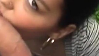Hot brunette sucks a truck driver's cock in a parking lot making him cum