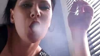 Brunette babe smoking while interrogating