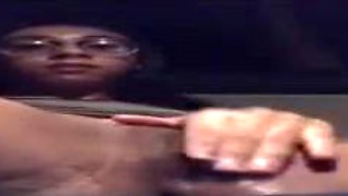 Wild dame with glasses is caressing and frigging her moist cooter in the back of a van