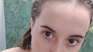 This student loves to play with her anus in the shower