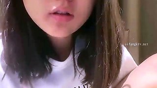 Skinny Amateur Asian teen masturbates with big dildo