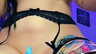 Gothic Babe in Sexy Lingerie Masturbates with a Big Dildo and a Plug in Her Anus