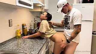 Horny wife enjoys a deep doggystyle fucking in the kitchen