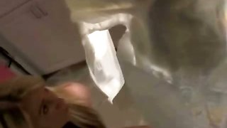 Blonde babe pissing on diaper and drinks it