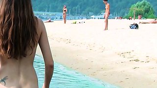 Hot young nudists secretly filmed having fun