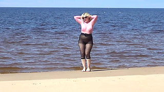 Funny MILF with Nylon Ass and Tits on Beach