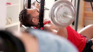 Hot slender girl with nice small tits wants to fuck with her boyfriend in the middle of his heavy lifting session