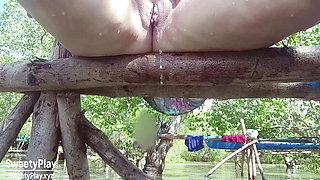 Chubby shaved pussy peeing outdoors