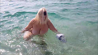 Streptease on a Nude Beach