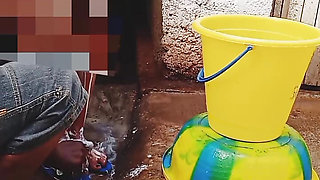 Outdoor bathing my pregnant girlfriend in dirty environment.