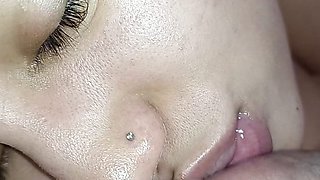 Masturbation on the face of the naughty slut, who loves hard cock popping in her little mouth