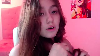 Small titted brunette teen fingering on the bed