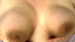 Playing with my natural tits