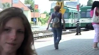 Half-naked teeny squats down to piss at a train station