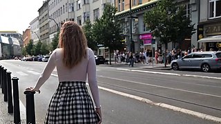 Pantyless European MILF vixen flashing her pussy in public