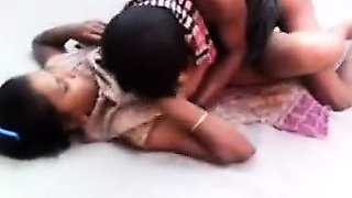 A village girl is having first time sex with a local boy