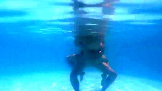 Busty milf goes skinny dipping and gets dicked down in a pool
