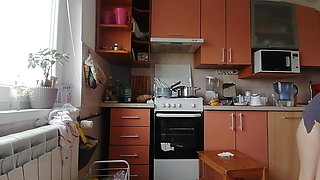 Sexy amateur wife prepares breakfast naked in the kitchen.