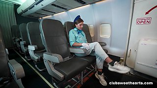Sexy stewardess Aurora Heat takes off her panties to masturbate