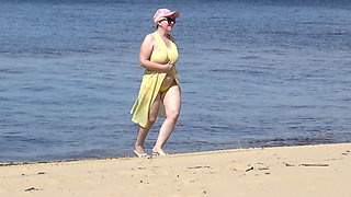 Juicy Woman Walking Naked on Beach