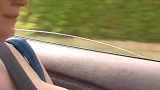Topless Car Dricing in the Midde of Day