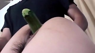 Naked asian teen gets hairy twat nailed with vegetables