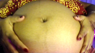 Pregnent lady playing big belly short.