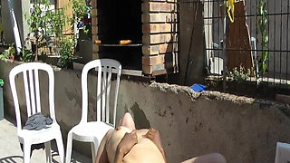 A Big Black Cock Is Fucking a Blonde MILF on the Terrace.