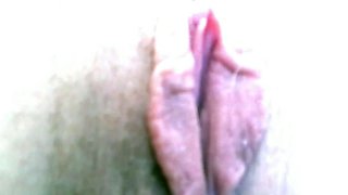 Amateur redhead Jacqueline with glasses masturbates