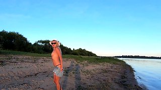 Russian Nudist on the River Shore