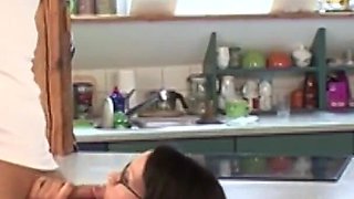 Skinny Dark Haired German MILF with Glasses Fucks on The Kitchen Counter