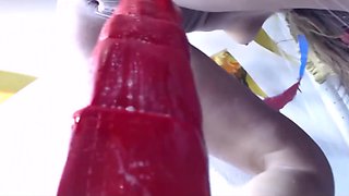 Bratty blonde moans while gaping her anal with giant dildo