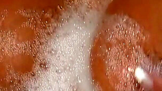 Beautiful brunette with amazing boobs and ass gets banged in the bathtub