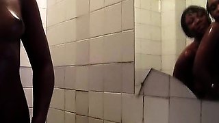 Big booty African shares the shower with her beautiful