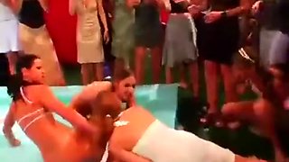 Oil Wrestling Girls stripping each other