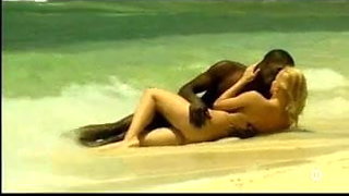 Young blonde white girl with black lover on the beach - Interracial
