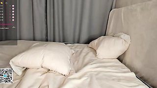 Small titted brunette Sharron with glasses masturbates