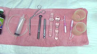 Lesbian piss inside the Uterus of other with tube in PeeHole