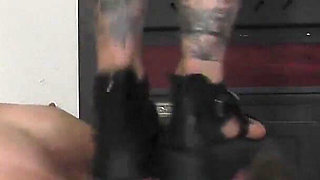 Mistress Cleo Stands on His Slave and Smokes