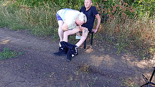 Stepmom sucks my dick in a public park on a bench until I cum