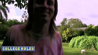 College students engage in wild outdoor game of kickball naked and wet with big boobs, trimmed pussy, and blowjob action.