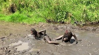 two girls Jane in mud