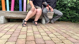 Mother-in-law masturbates her stepsons cock in a public park