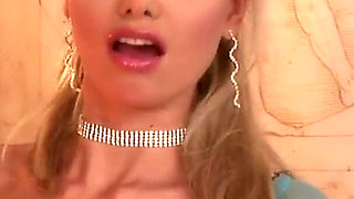 Fishnet stockings and a toy cock in this sexy woman's wet pussy