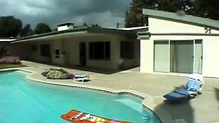 Big breasted ebony chick blows a black dick by the pool