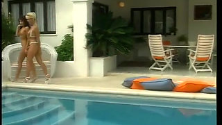 Very sexy lesbians in the swimming pool