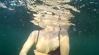 Swimming and Flashing in the Sea